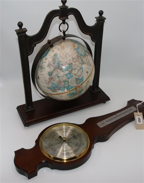 Modern Chatsworth globe by Thomas Blakemore and a banjo barometer by Comitti of London